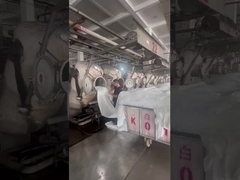 Filmagem no local do processo de produção da própria fábrica de tecidos da Jiarui Textile Company