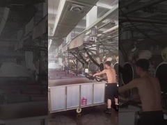 Filmagem no local do processo de produção da própria fábrica de tecidos da Jiarui Textile Company